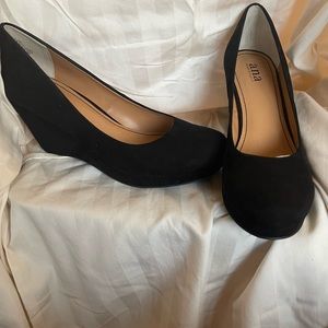 Black suede wedge.